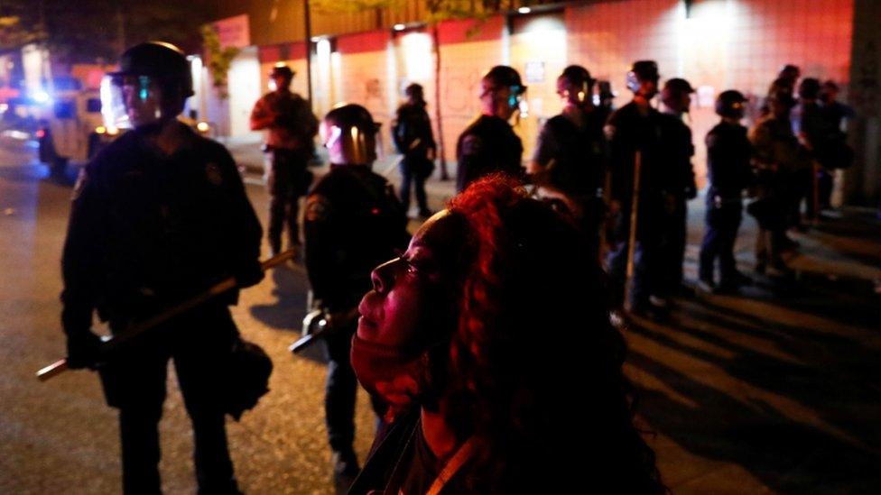 Protesters and police in Minneapolis