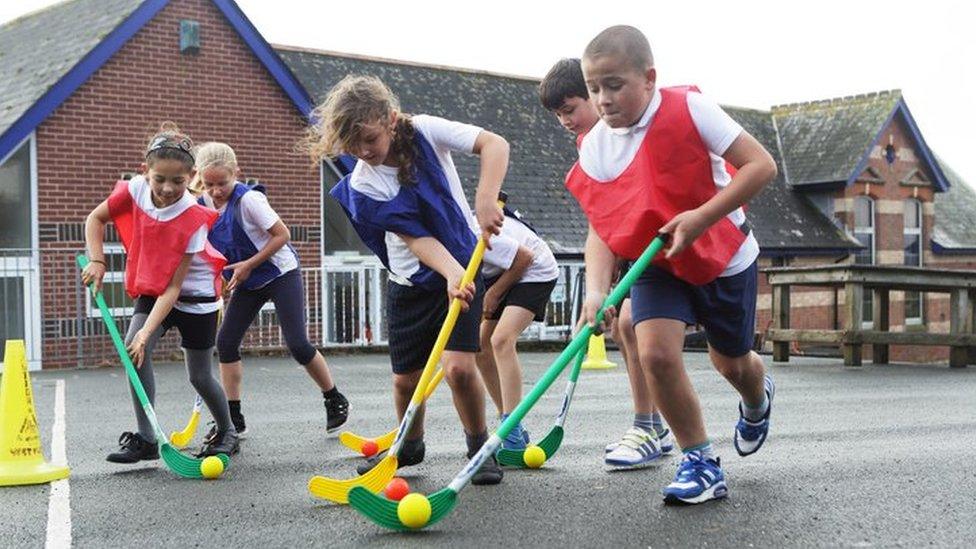 children playing hockey