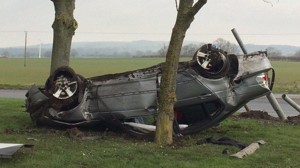 Car lying on its roof