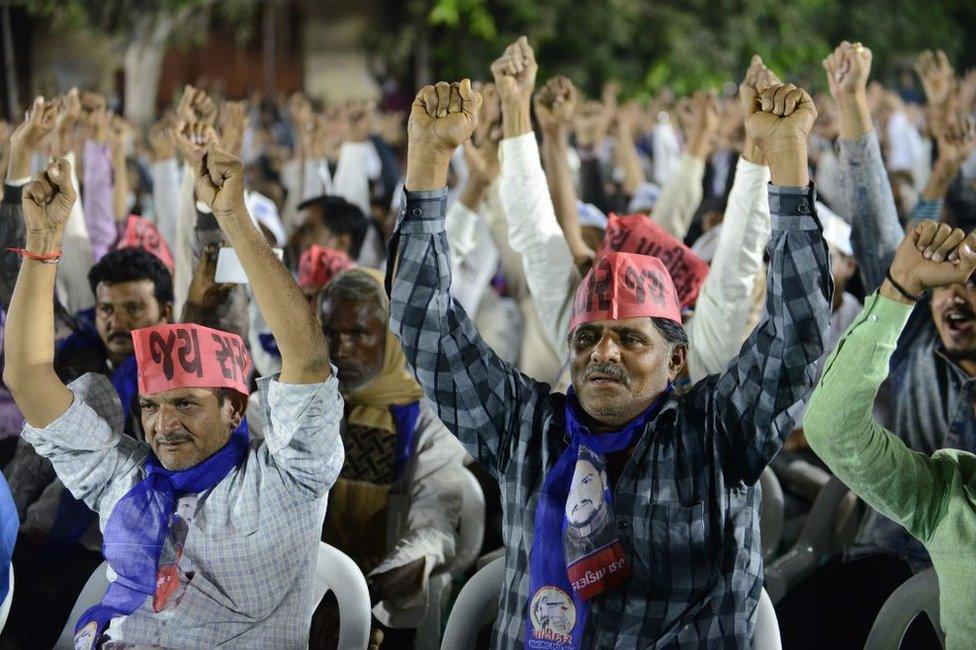 His picture taken on November 18, 2017 shows supporters of Hardik Patel, leader of Patidar Anamat Andolan Samiti (PAAS), participating in a gathering during 'Adhikar Sammelan' at Mansa, some 50 km from Ahmedabad