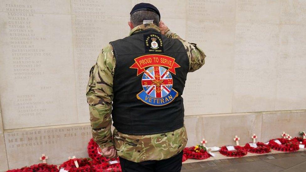 Motorcyclist at memorial wall