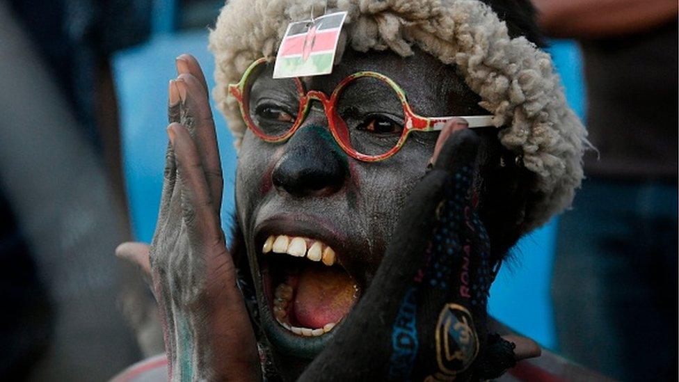 A Kenyan football supporter celebrates (archive shot)