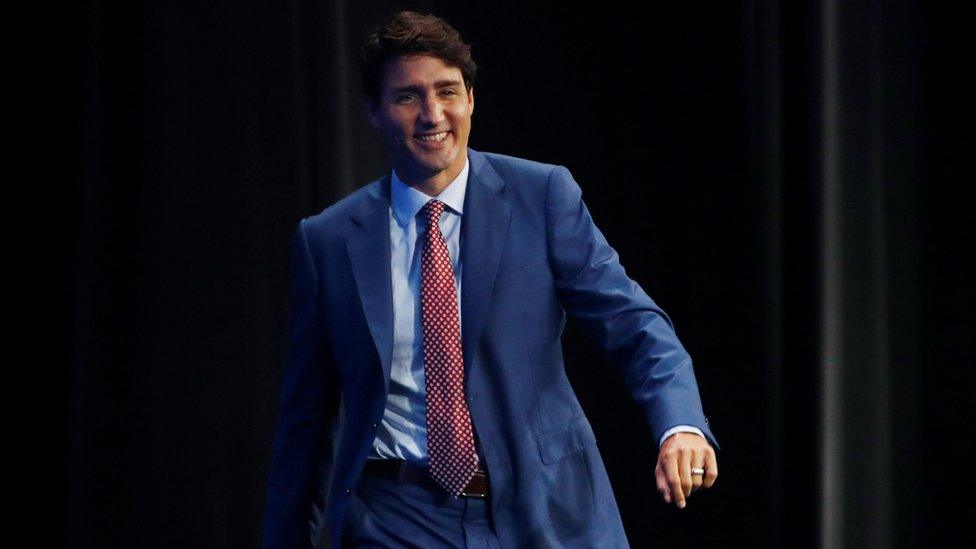 Canada's Prime Minister Justin Trudeau arrives to speak on stage at the Alibaba Gateway Conference in Toronto