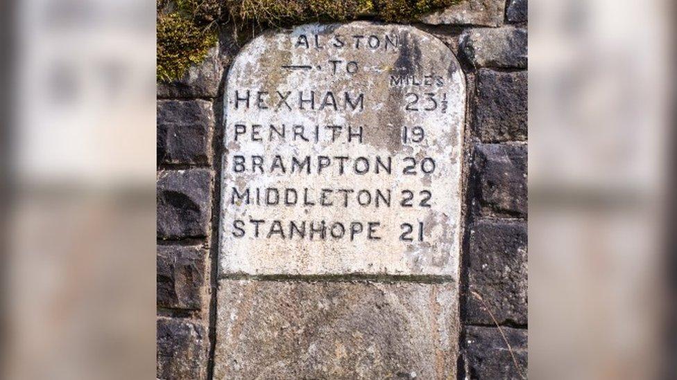 Alston traditional stone road sign