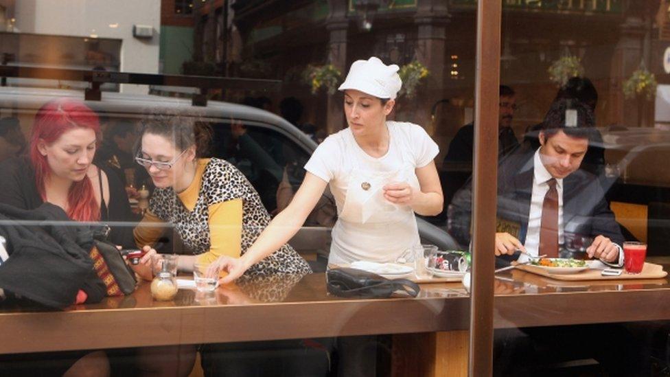 A waitress in a cafe