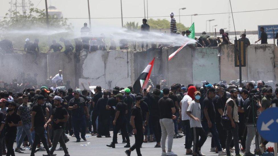 protesters outside the protected zone