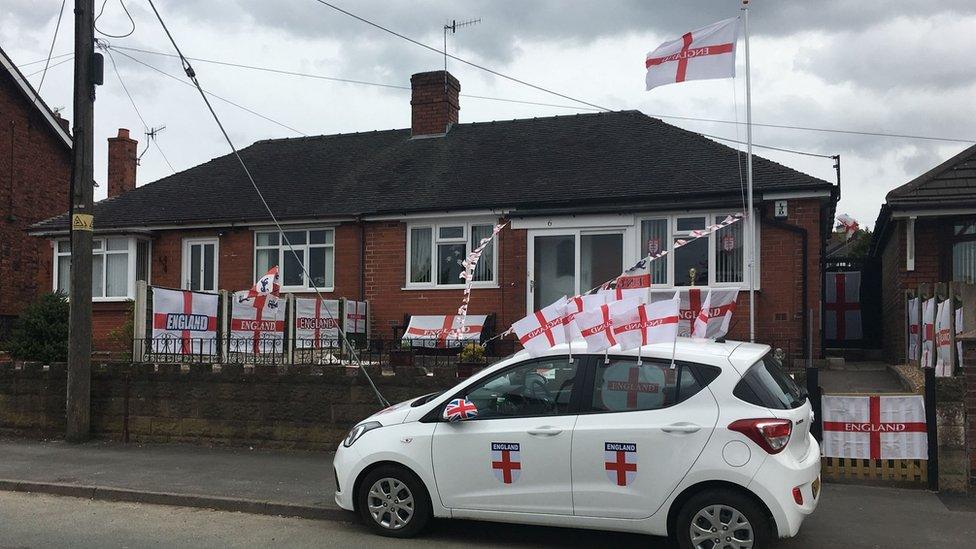 House covered in England flags