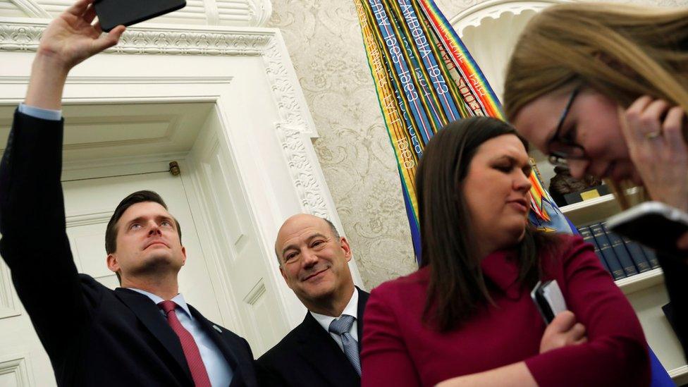 White House Staff Secretary Rob Porter (L), White House chief economic adviser Gary Cohn (2nd L) and White House Press Secretary Sarah Huckabee Sanders