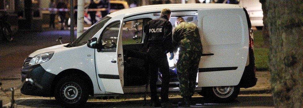 A van is searched during a terror alert in Rotterdam on 23 August