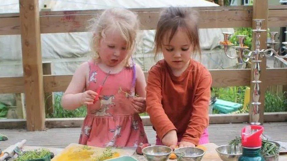 Children play at a nursery