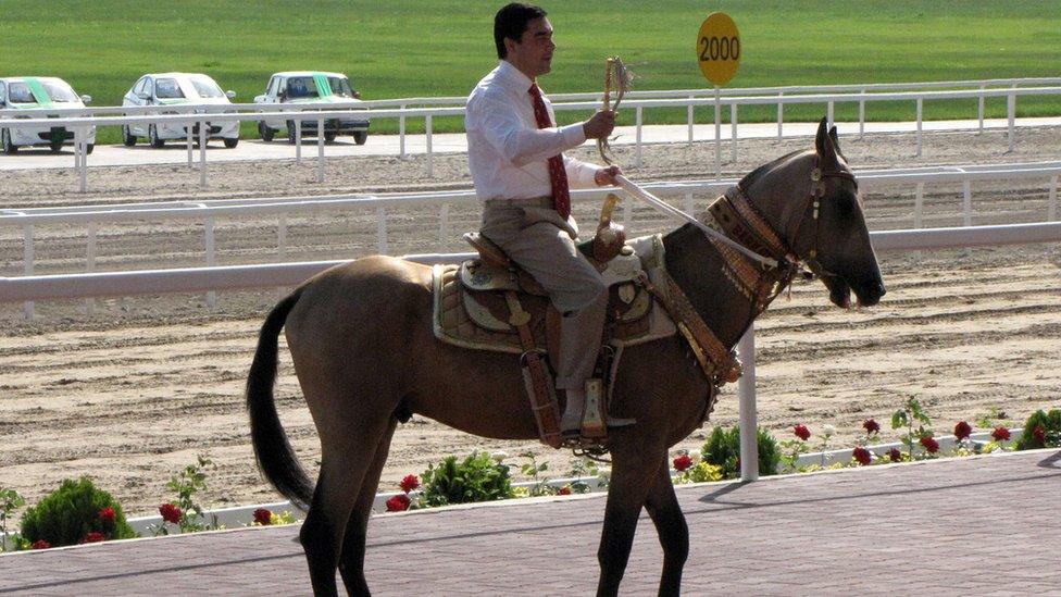 Mr Berdymukhamedov rides a horse as he attends the Day of the Turkmen Race Horse holiday in Ashgabad in 2012