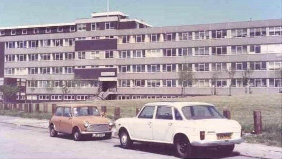 cars outside the station in the 1970s