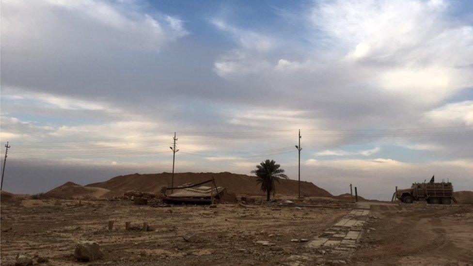 Image showing a tower or Ziggurat reduced to a pile of rubble