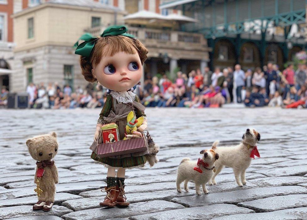 A doll and Ted at Covent Garden