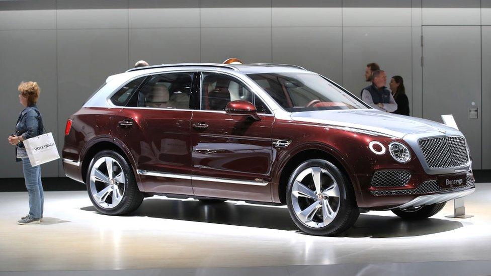 A Bentley Bentayga luxury SUV stands on display at German car manufacturer Volkswagen AG's annual general shareholders' meeting on May 3, 2018 in Berlin