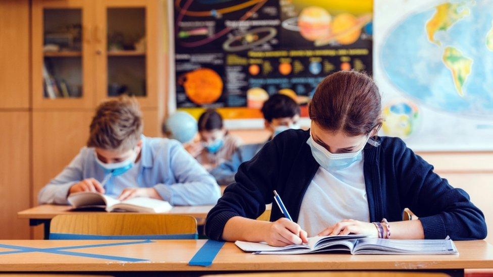 Pupils wearing face masks