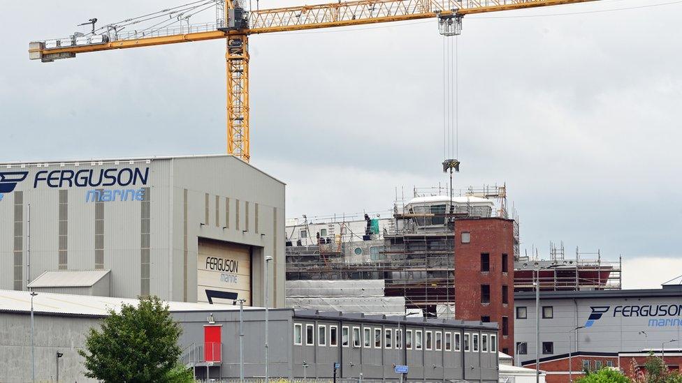 Exterior of Ferguson marine with a crane working on Glen Rosa