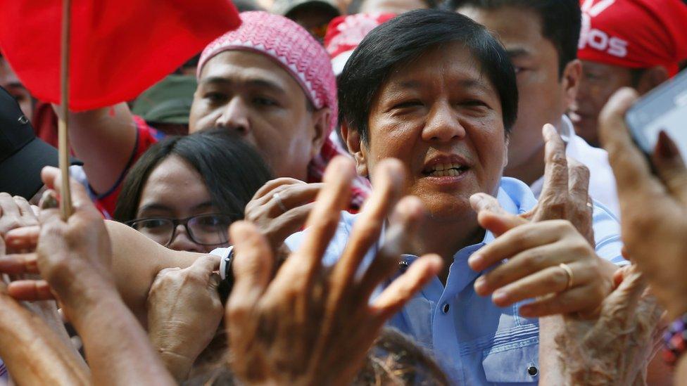 Ferdinand 'Bongbong' Marcos Jr is greeted by Marcos loyalists