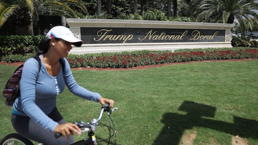 A sign reading Trump National Doral is seen on the grounds of the golf course owned by Republican presidential candidate Donald Trump on June 1, 2016 in Doral, Florida. Reports indicate that a PGA Tour event that has been held at the Trump National Doral since 1961 is heading to Mexico City in 2017