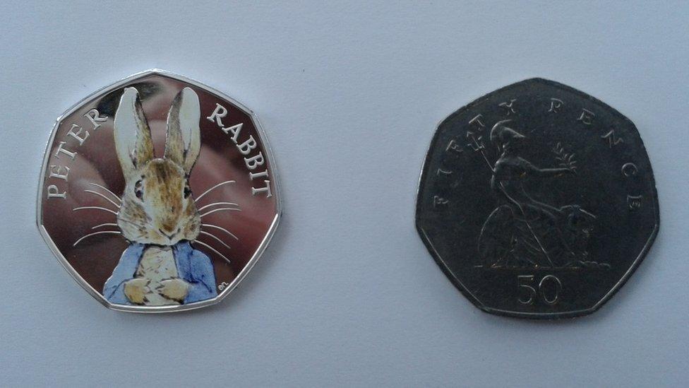 Peter Rabbit coin next to normal 50p