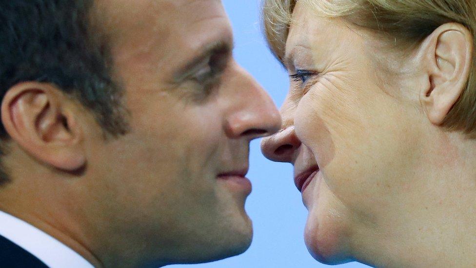 French President Emmanuel Macron and German Chancellor Angela Merkel attend the press conference after the meeting at the Chancellery in Berlin, Germany June 29, 2017