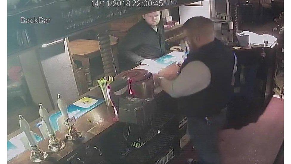 Man in a pub on CCTV