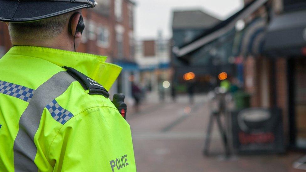 Police officer in town centre