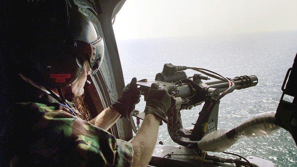 A Royal Navy helicopter patrols off the coast of Sierra Leone in May 2000