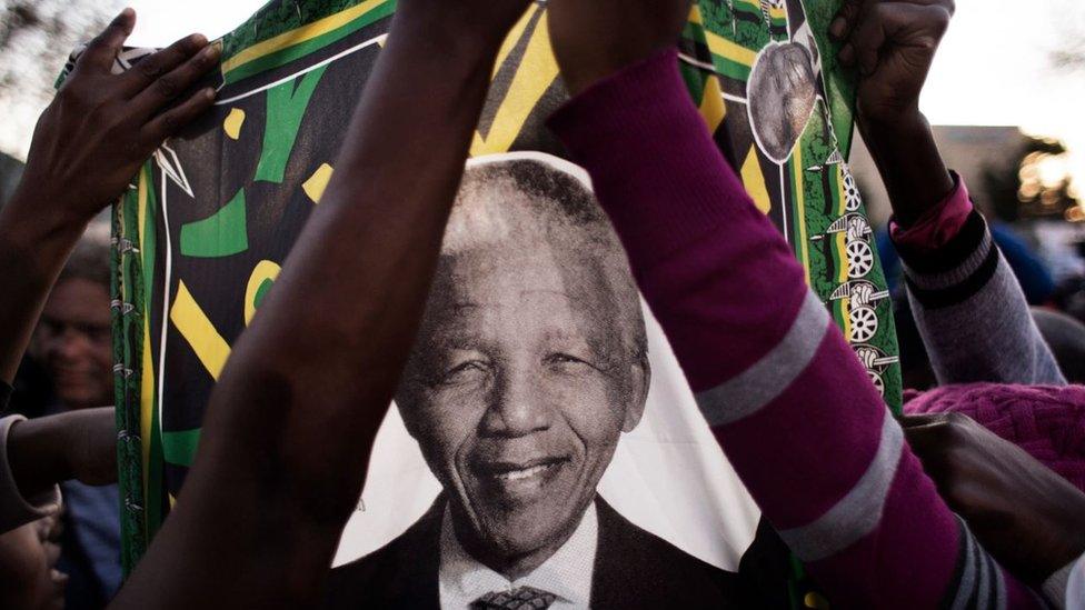 Nelson Mandela picture on a flag