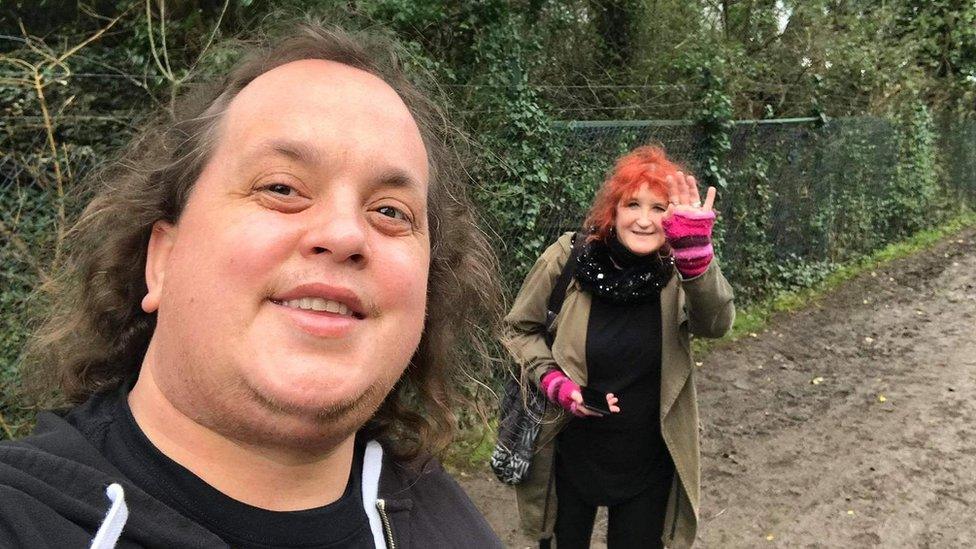 Simon Joyce and his mum Diane walking