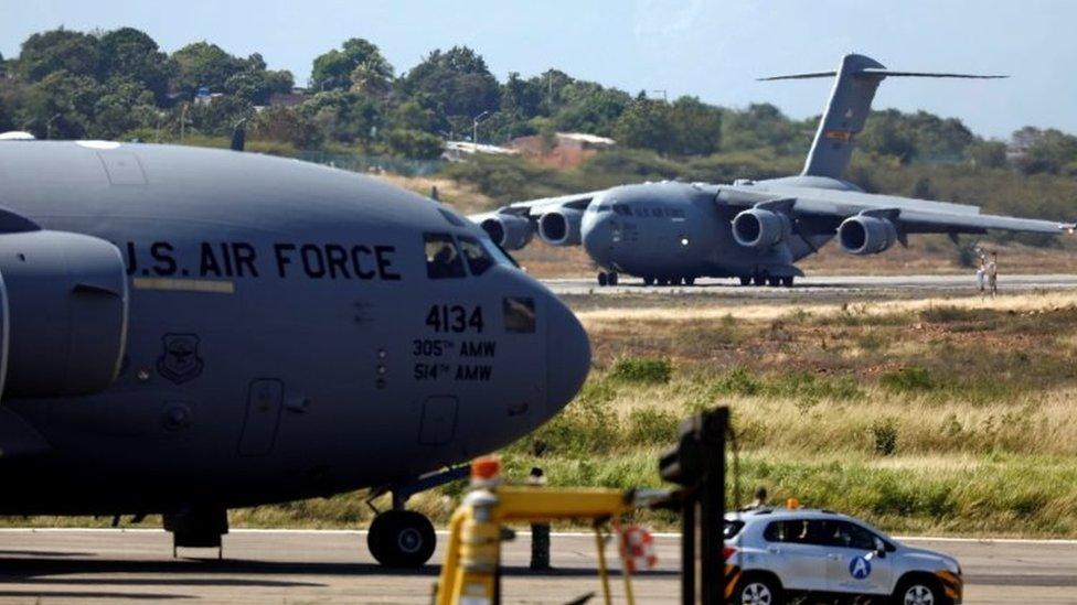 Humanitarian aid for Venezuela is inspected after being unloaded from a U.S. Air Force plane at Camilo Daza Airport in Cucuta, Colombia February 16, 2019