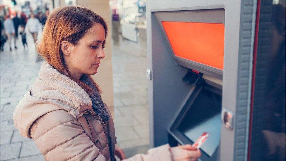 woman at atm