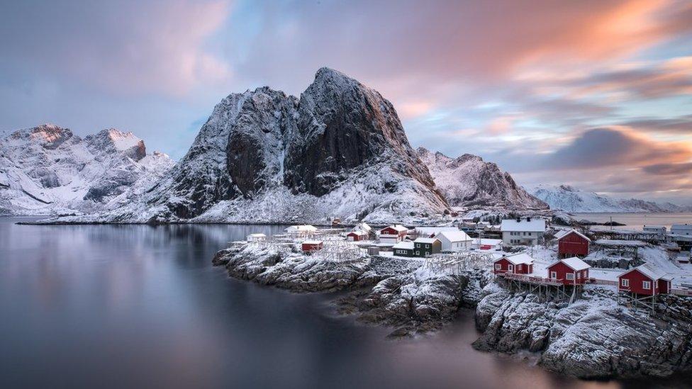 Snow-capped village and mountain