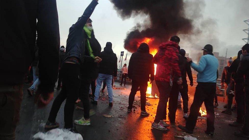 File photo showing people protesting against a petrol price rise in Tehran, Iran (16 November 2019)