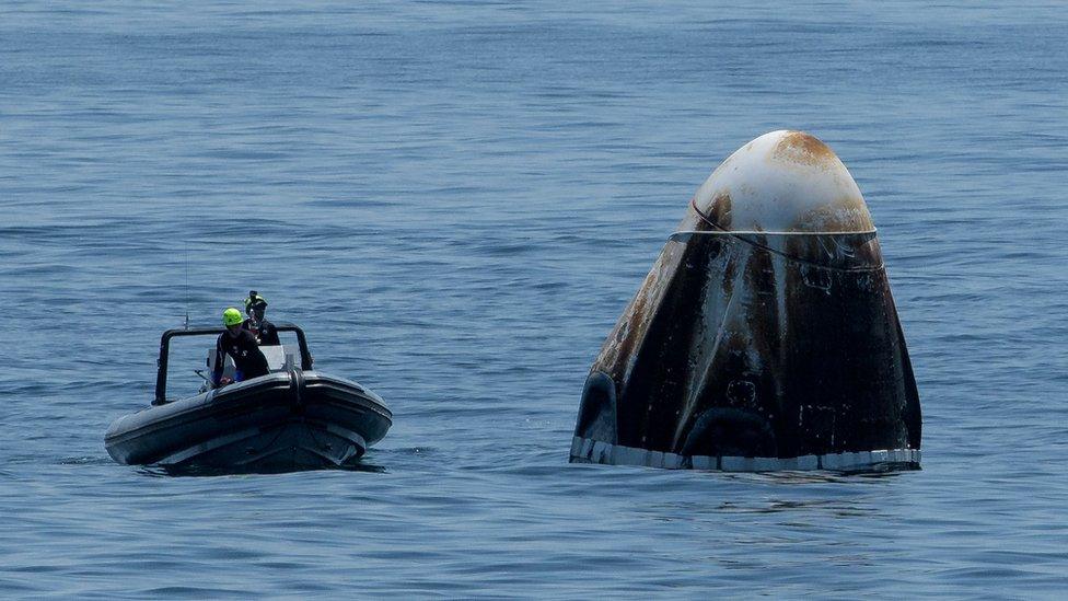 Capsule the astronauts returned in at sea