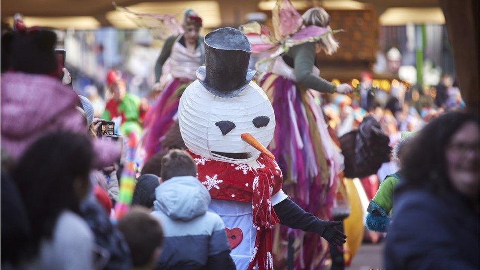 person in snowman costume