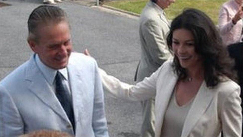 Catherine Zeta Jones and Michael Douglas on a visit to the Longfields Centre in 2005