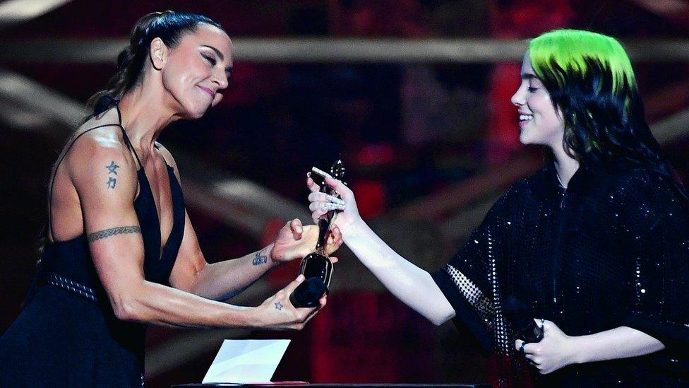 Spice Girl Mel C hands Billie Eilish her award for best international female