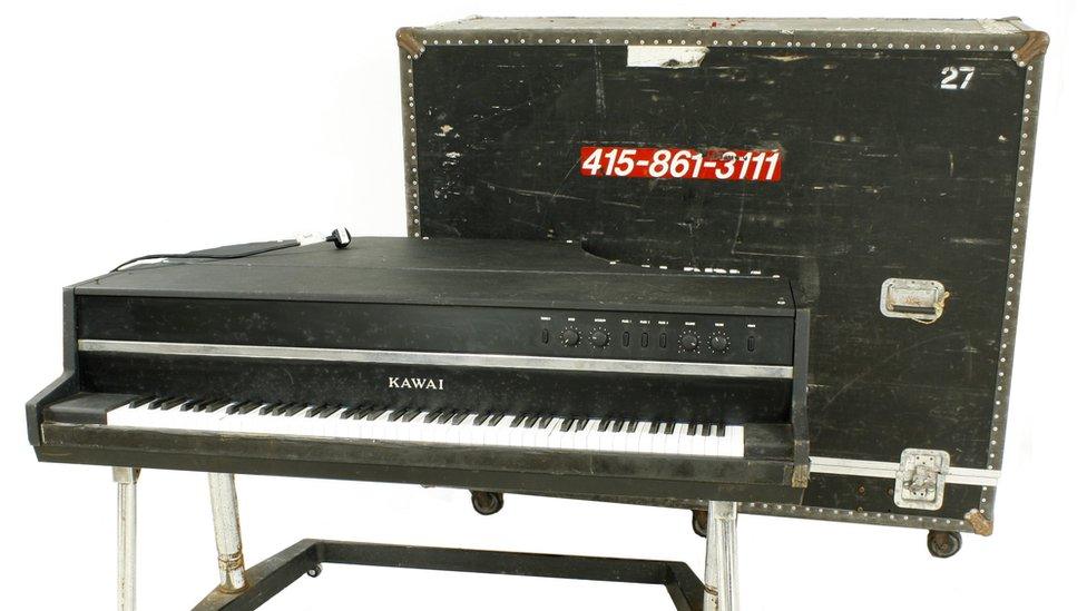 Piano once owned by the band Queen