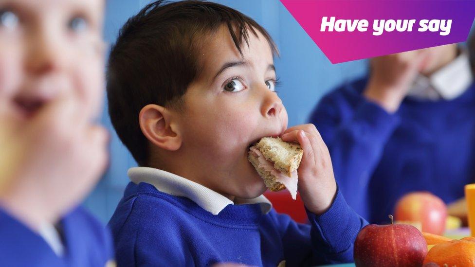 Child eating sandwich