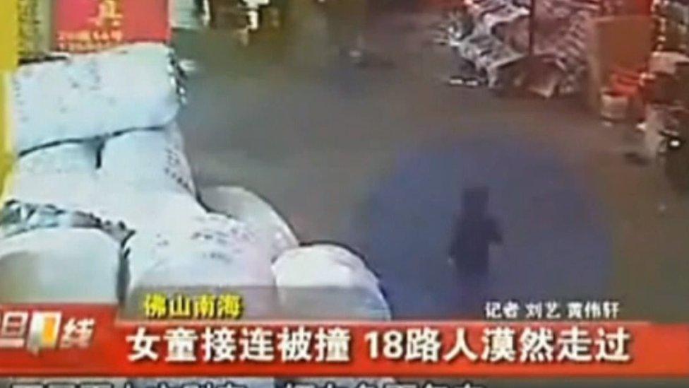 Wang Yue pictured on CCTV before being struck by a vehicle