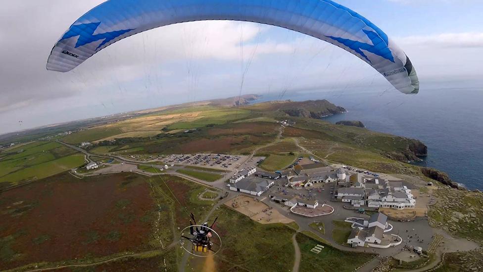 Aerial view of Daniel Jones arriving in Land's End