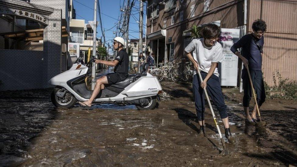 Cleaning up in Kawasaki, Japan, after the typhoon