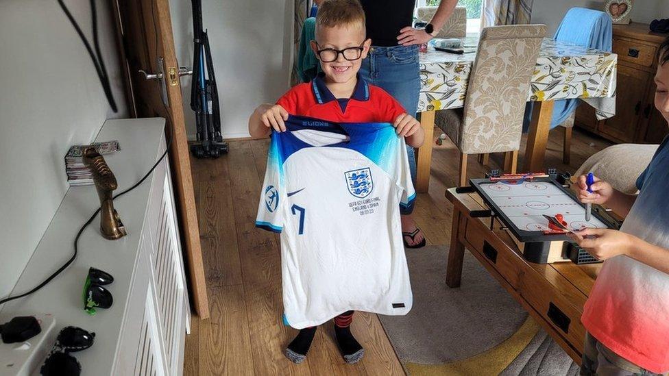 Oliver with Morgan Gibbs-White's shirt