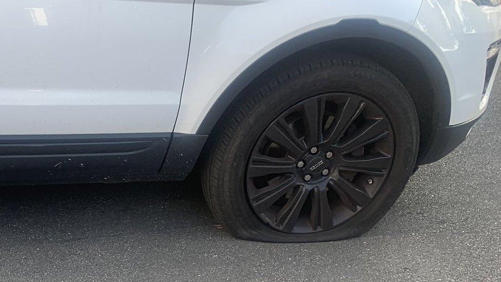 Nazir Afzal's car with burst tyre