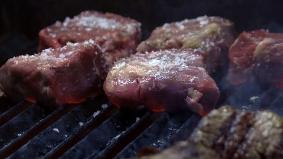 Steaks cooking