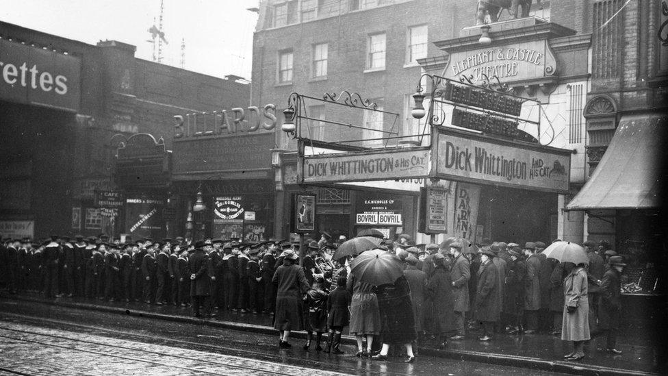 1928: A crowd of young sailors arriving at the Elephant and Castle Theatre, London, to see the pantomime 'Dick Whittington'.