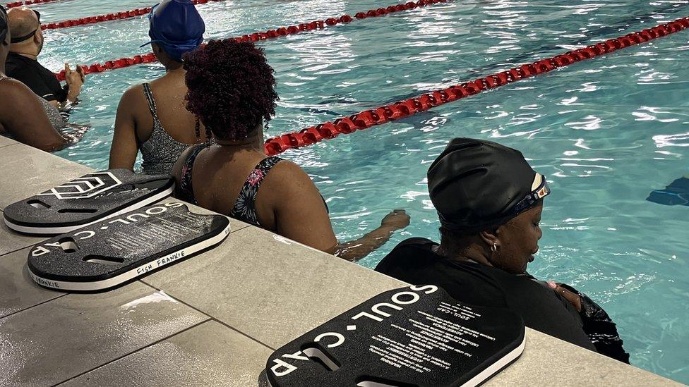 Photo of swimmers in the pool