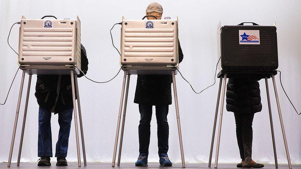 Voters casts their ballots in the primaries in Illinois, Chicago