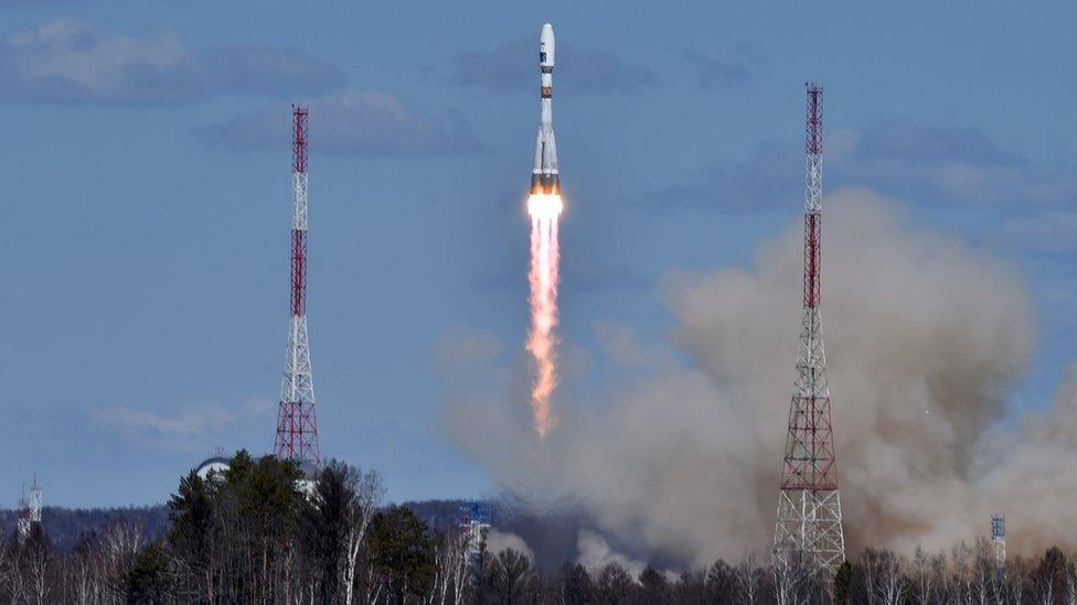 A Russian Soyuz 2.1a rocket carrying Lomonosov, Aist-2D and SamSat-218 satellites leaves a trail of smoke as it lifts off from the new Vostochny cosmodrome outside the city of Uglegorsk